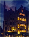 Historical houses at Market Square of Bruges, Belgium at night