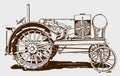 Historical kerosene tractor in side view