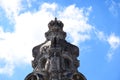 Historic eclectic style tower detail in Budapest. blue sky and white clouds. Royalty Free Stock Photo