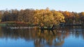 Historical monument. Autumn park, lakes and trees.