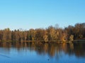 Historical monument. Autumn park, lakes and trees.