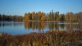 Historical monument. Autumn park, lakes and trees.