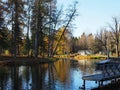 Historical monument. Autumn park, lakes and trees.