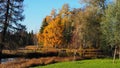 Historical monument. Autumn park, lakes and trees.