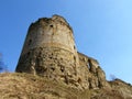 Historical monument. View of the stone walls and towers of the ancient fortress of Koporye. Russia.