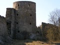 Historical monument. View of the stone walls and towers of the ancient fortress of Koporye. Russia.