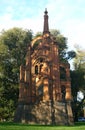 Classic and historic red sandstone Boer War Memorial with piers, arches, flying buttresses and stone base in Melbourne, Australia