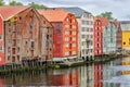 Historical Old Timber Buildings and the river Nidelva in Trondheim. Royalty Free Stock Photo