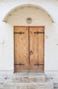 Historical Ornate Wooden Door in a Stone Entry Royalty Free Stock Photo