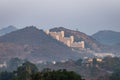 historical palace architecture at misty mountain top at morning