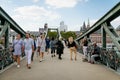 Historical pedestrian Eiserner Steg, Iron footbridge over the Main river, consists of riveted steel trusses, two bridge piers,