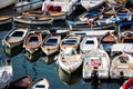 Historical port with boats in the marina, with the castle behind, in Naples