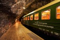 Historical railway carriage Flamsbana train staying in the railway station in tunnel.