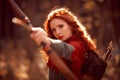 Archer with red hair Royalty Free Stock Photo