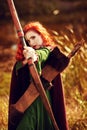 Redhead femal archer