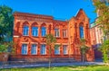 Historical red brick building on sobornosti street in Poltava, Ukraine