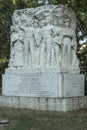 Historical sculpture in public park dedicated to marble workers rights achievment, Carrara, Italy
