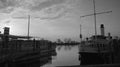 Historical ships at lake constance after sunset in black and white