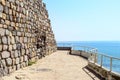 Historical southern walls over the BLack sea cove in Sozopol, Bulgaria, Europe at dusk.