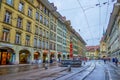 Historical Spitalgasse street in Innere Neustadt with colorful Pfeiferbrunnen fountain in the middle of the road in Bern,