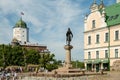 Historical square of city with view of medieval defensive fortress