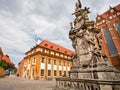 Historical statue with angels near the churches of the old polish city