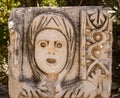 Historical Stone faces bas relief and ancient theater at Myra ancient city. Demre, Antalya, Turkey. Royalty Free Stock Photo