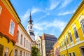 Historical street and buildings with colorful facades in the historical center of Budapest, Hungary. Lutheran Church of Budavar in Royalty Free Stock Photo