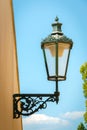 Historical street lamp on wall, Prague Royalty Free Stock Photo