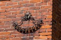 Sundail on an old franconian bavarian brick wall