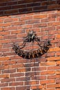 Sundail on an old franconian bavarian brick wall