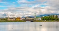 Historical and touristic downtown in Reykjavik at Summer in Iceland, cityscape at sunset at inner lake around Tjornin city park in Royalty Free Stock Photo