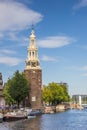 Historical tower Montelbaanstoren in Amsterdam