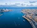 Valletta and Sliema natural harbor aerial high altitude at sunset with sailing boats Royalty Free Stock Photo