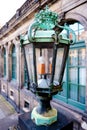 A historical vintage copper lamp at palace Zwinger in Dresden, Germany. Royalty Free Stock Photo