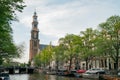 The historical Westertoren church with canal view