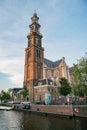 The historical Westertoren church with canal view