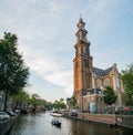 The historical Westertoren church with canal view