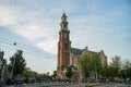 The historical Westertoren church with canal view