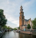 The historical Westertoren church with canal view