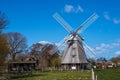 Historical wind mill with trees in Ahrenshoop, Germany