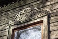 Historical window with zoomorphic ornament, old building facade Royalty Free Stock Photo
