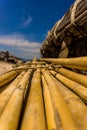 Historical wooden shipwreck reconstruction detail with bamboo on land, Urla, Izmir, Turkey. Ancient Greek culture, Kyklades ship Royalty Free Stock Photo