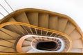 Historical wooden spiral staircase, the view from above architecture background  Interior of the magnificent mansion with grand Royalty Free Stock Photo