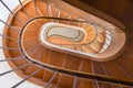 Historical wooden spiral staircase, the view from above architecture background  Interior of the magnificent mansion with grand Royalty Free Stock Photo