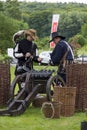 History fans dressed as 17th century mercenary soldiers load his