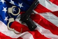 History. handcuffs and gun USA flag Royalty Free Stock Photo
