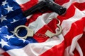 History. handcuffs and gun USA flag Royalty Free Stock Photo