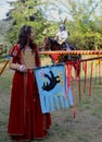 History lovers - pretty young girl in a historical costume