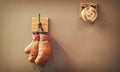 History of sport. vintage gong and worn gloves. stamina. final gong in battle retro boxing gloves. vintage sport